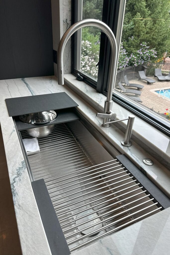 Luxury New York kitchen with a Galley 4-ft sink workstation in stainless steel