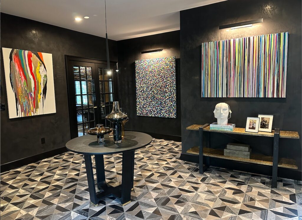 Art collector's luxury New York home foyer with fine art on display