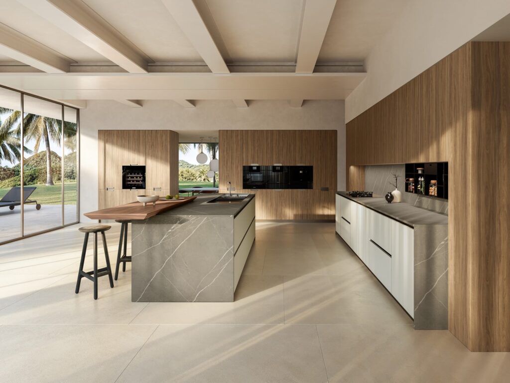 Large contemporary kitchen with L-shaped layout and central island with breakfast table.