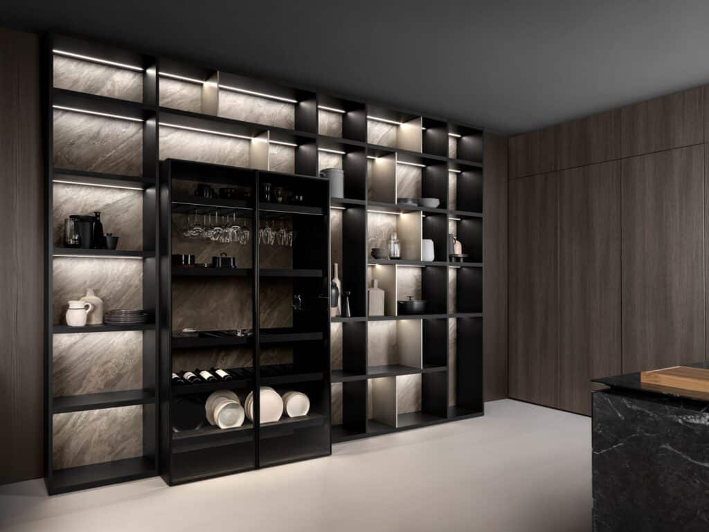 Luxury custom bookcase in Black wood with Inalco ceramic back panel as part of a custom kitchen design.