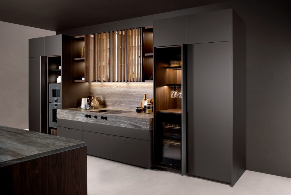 Contemporary custom made kitchen. Luxury cabinets with pocket doors and integrated appliances.