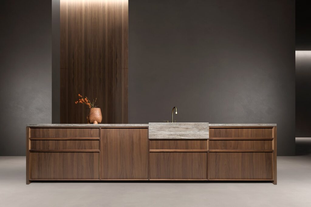 Luxury bespoke kitchen island with framed Walnut cabinets.